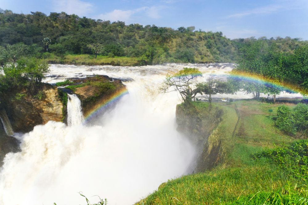 Rainbow over the roaring waterfall